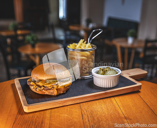 Image of Freshly made cheeseburger