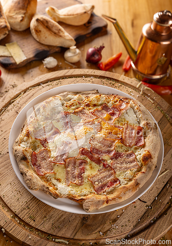 Image of Carbonara pizza with bacon