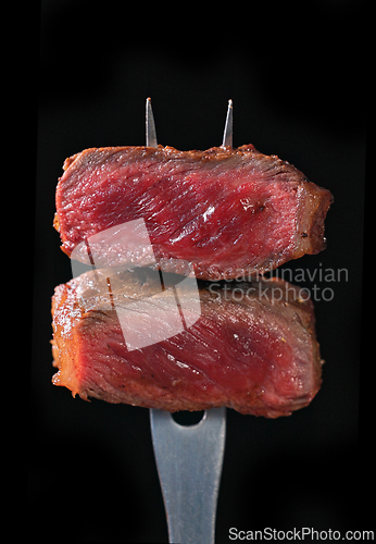 Image of two pieces of freshly grilled beef steak