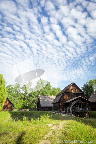 Image of Old water mill in the morning sun