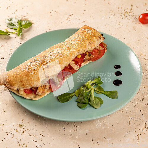 Image of Ciabatta with juicy tomatoes and chicken breast