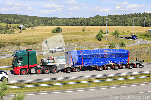 Image of Semi Trailer Hauls Heavy Transport on Motorway