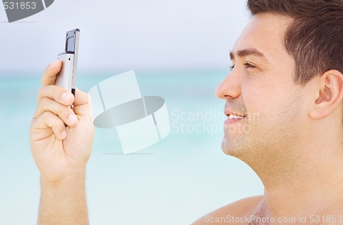 Image of happy man with cell phone