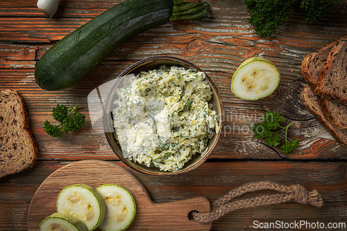Image of Bowl of delicious zucchini cream cheese