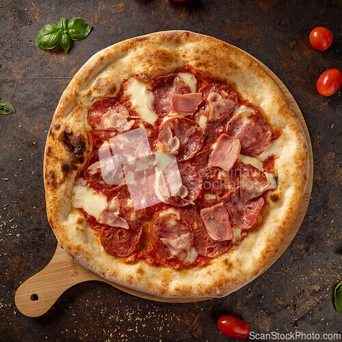 Image of Frshly baked pizza with pepperoni