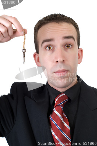 Image of Businessman Holding Key