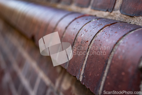 Image of Decorative red brick cornice