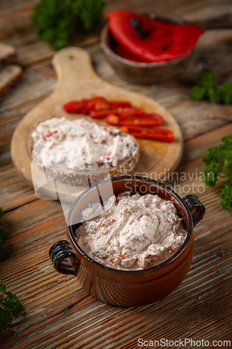 Image of Rustic bowl filled with a cream cheese