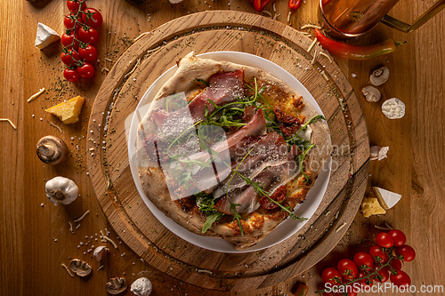 Image of Overhead view of a gourmet pizza