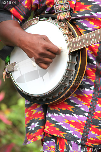 Image of Caribbean banjo player.