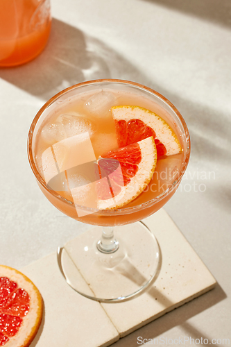 Image of glass of grapefruit juice
