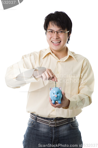 Image of Asian businessman saving money