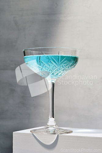 Image of glass of blue cocktail
