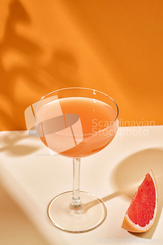 Image of glass of grapefruit juice drink