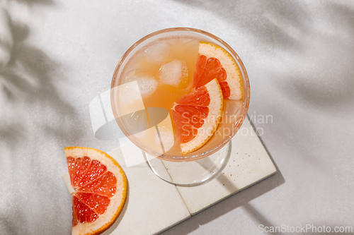 Image of glass of grapefruit juice