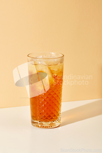 Image of glass of iced apple juice