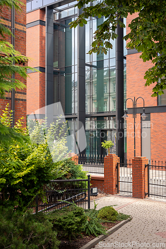 Image of Modern brick building with large glass window
