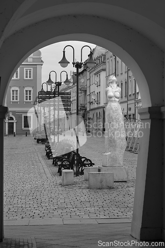 Image of View from under the arcades to the city square