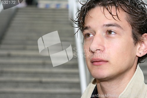 Image of young man and stairs