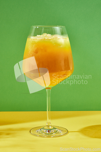 Image of glass of peach juice