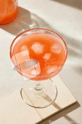 Image of glass of grapefruit juice
