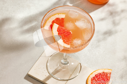 Image of glass of grapefruit juice