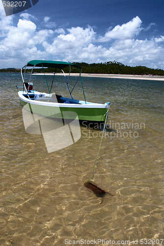 Image of Boat in crystalline clear sea in Brazil