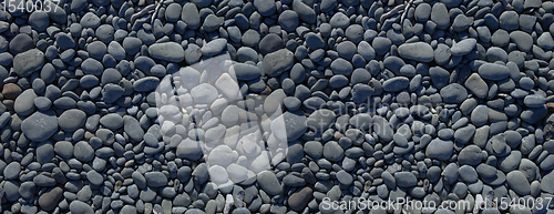 Image of Black pebbles background. Banner texture