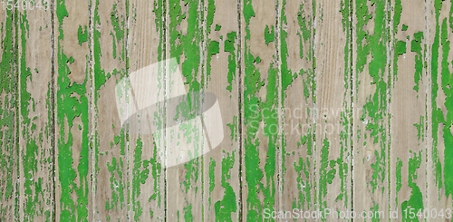 Image of Old wood board painted green. Banner background