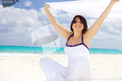 Image of happy woman with white sarong