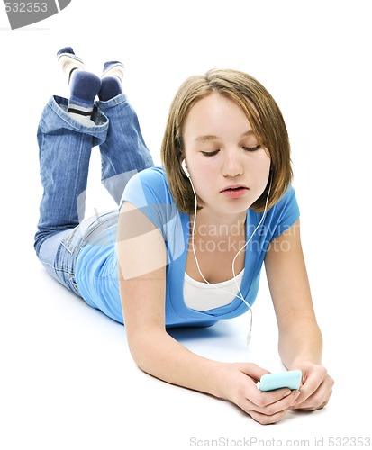 Image of Teenage girl listening to music