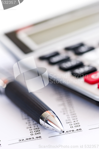 Image of Tax calculator and pen