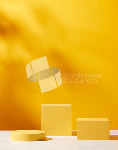 Image of yellow painted cubes