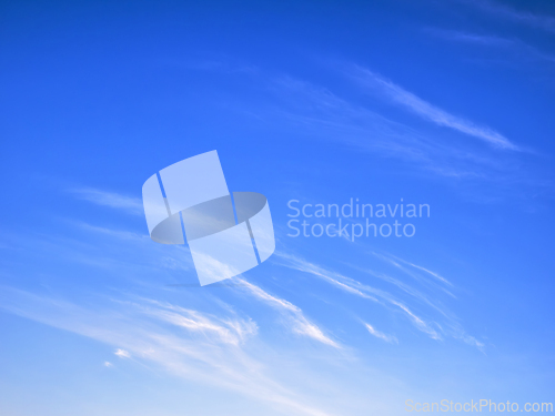 Image of White clouds on bright blue sky, high stratospheric light white 