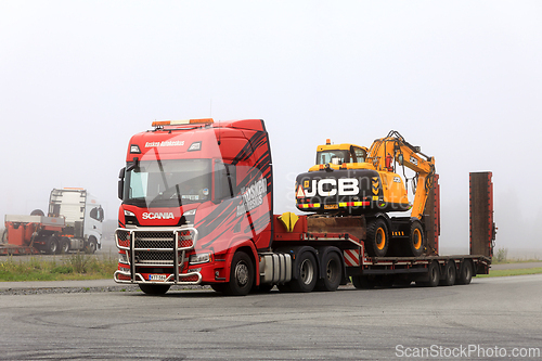 Image of Scania Truck Drop Deck Trailer Carrying JCB Wheeled Excavator