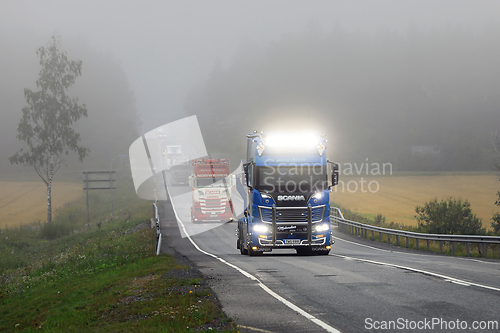 Image of Bright Headlights of Scania R660 Truck Ace of Spades