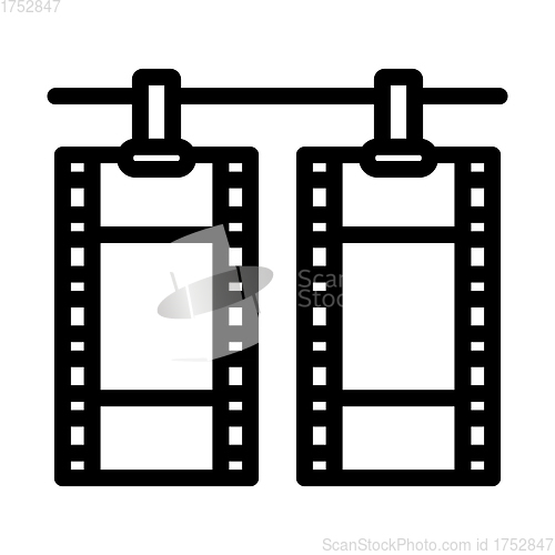 Image of Icon Of Photo Film Drying On Rope With Clothespin