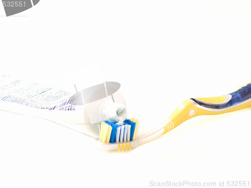 Image of Modern tooth brush and toothpaste isolated on white