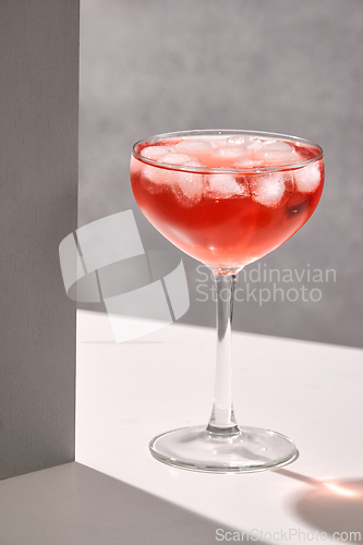 Image of glass of red cocktail
