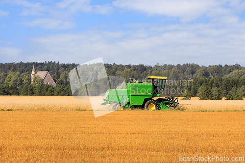 Image of Working in Field with John Deere 1024 Combine Harvester