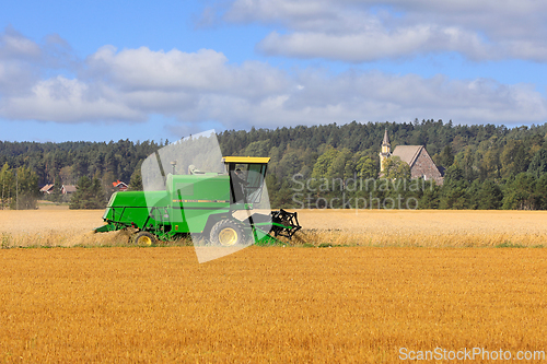 Image of Harvesting Wheat with John Deere 1024 Combine Harvester