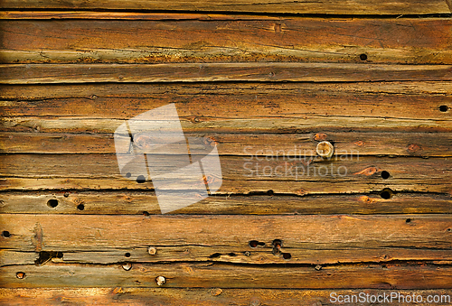 Image of Rustic wooden wall texture with distinct grains, knots, and smal
