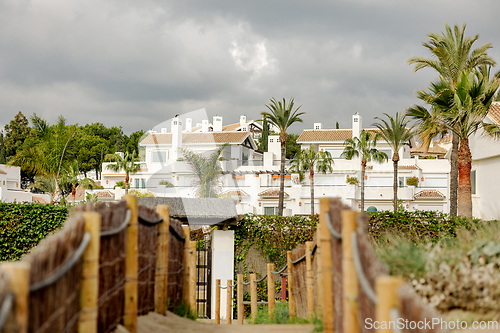 Image of backyard gate to Marbella beach