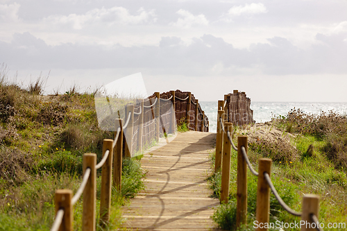 Image of backyard gate to Marbella beach