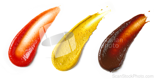 Image of various sauces on white background