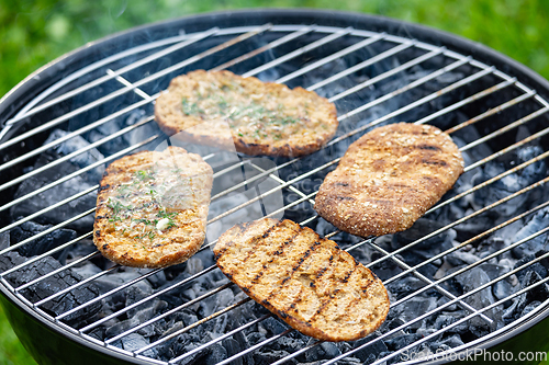 Image of bread buns on grill