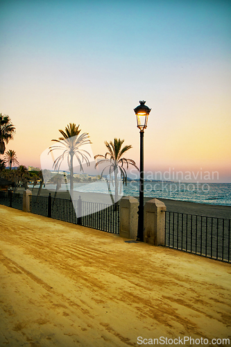 Image of Marbella promenade at sunset