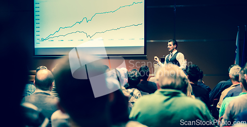 Image of Business speaker giving a talk at business conference meeting event.
