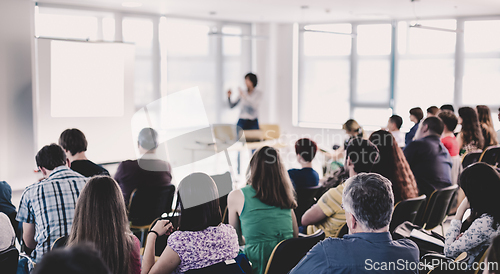Image of Businessman making presentation on corporate meeting event.