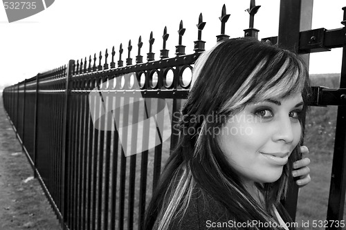 Image of Girl by the Fence